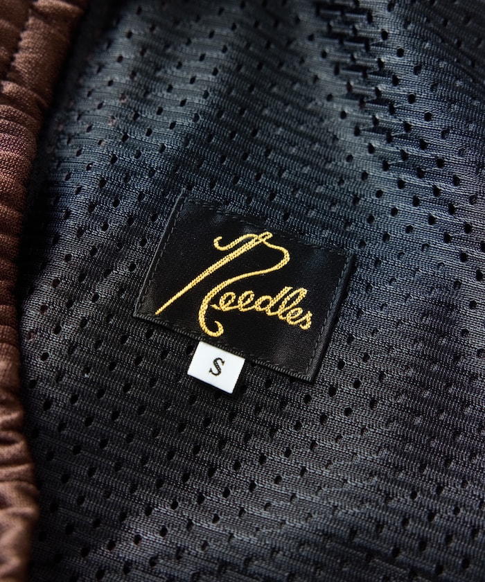 Needles/別注 H.D.TrackPant PolySmooth Brown×Charcoal｜Daytona Park